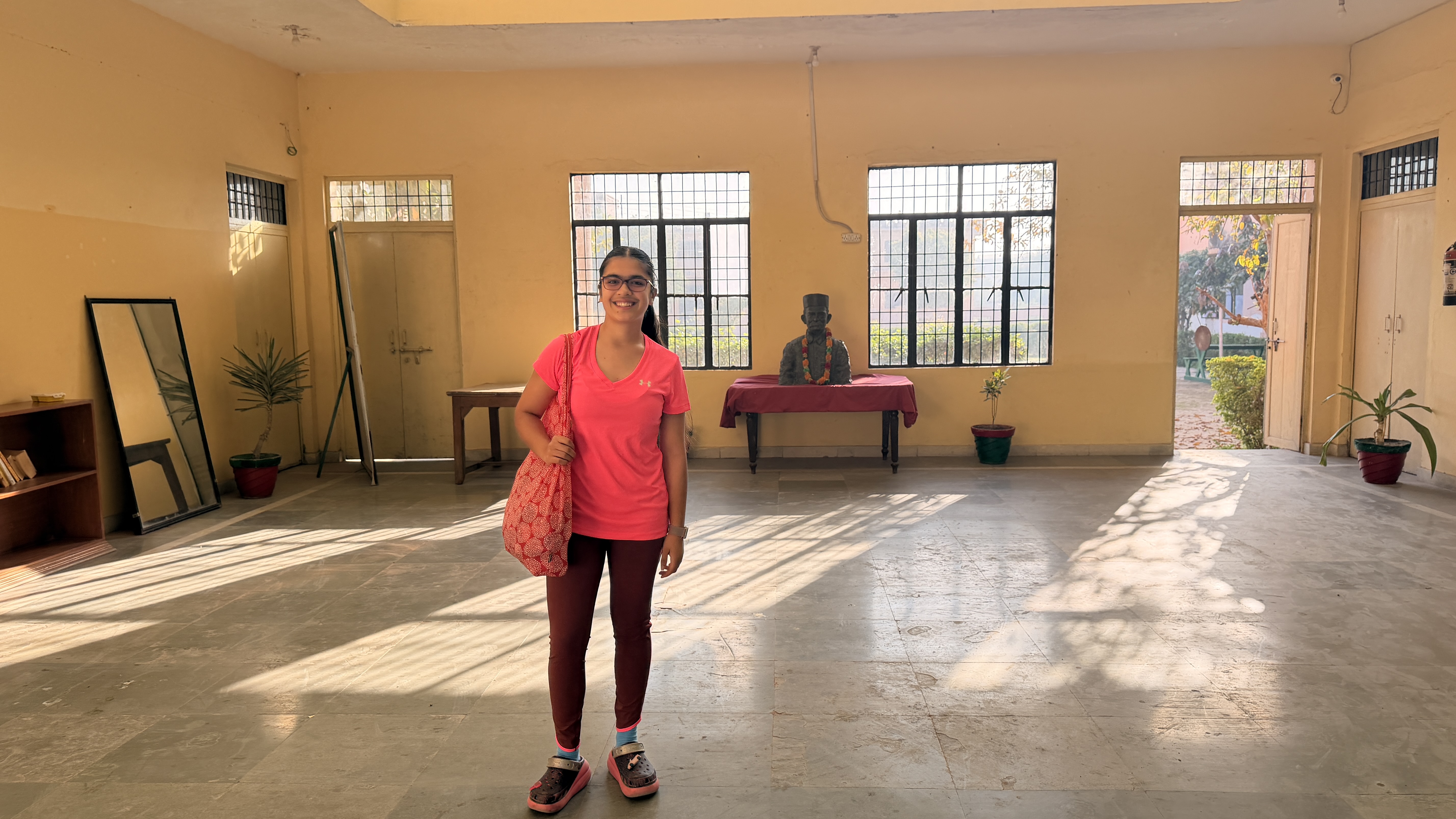 Students and teachers outside the school welcoming Youth for Yoga to Ferozabad