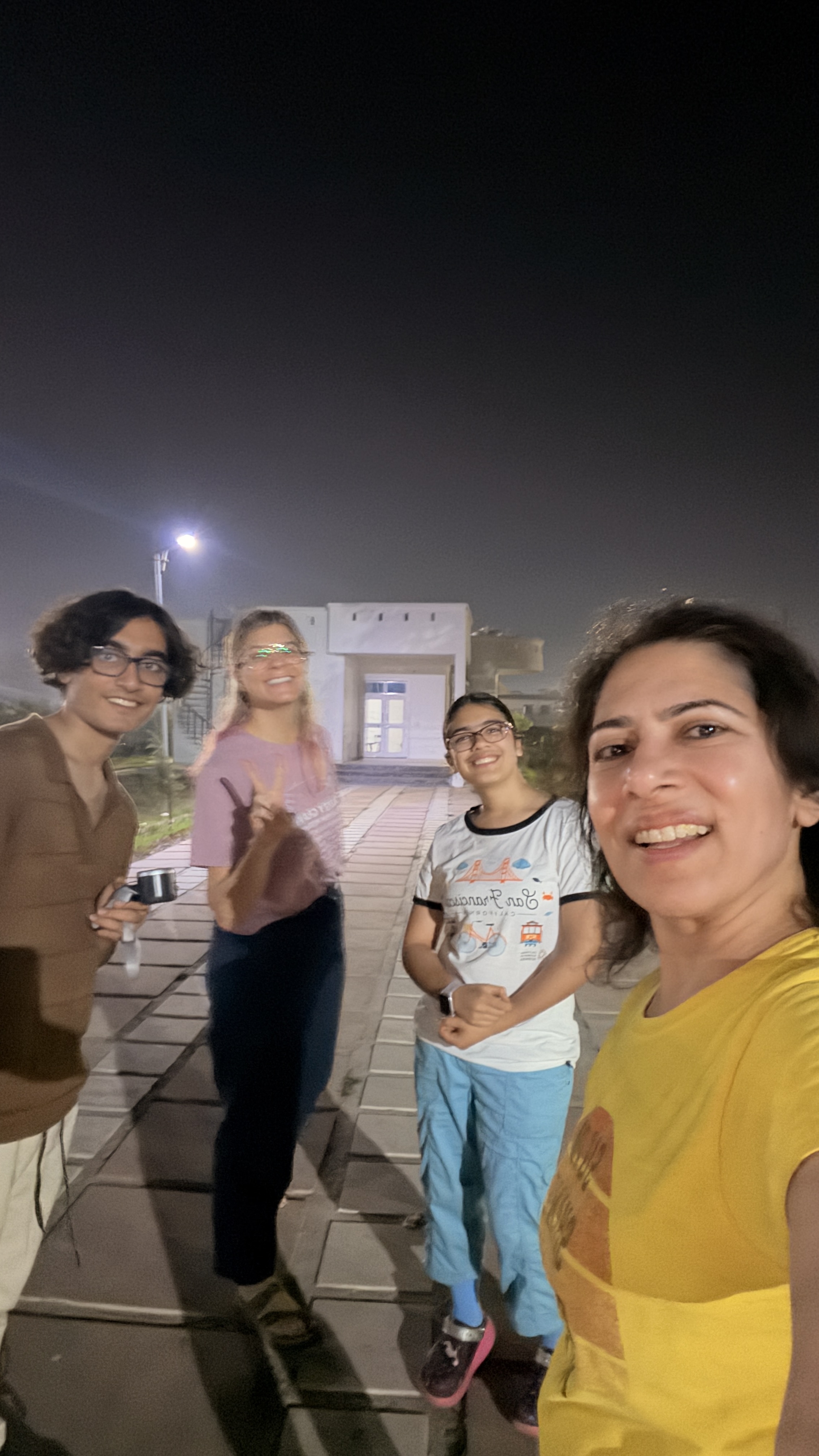 Youth for Yoga team members reflecting on the day at the guest house in Ferozabad, India