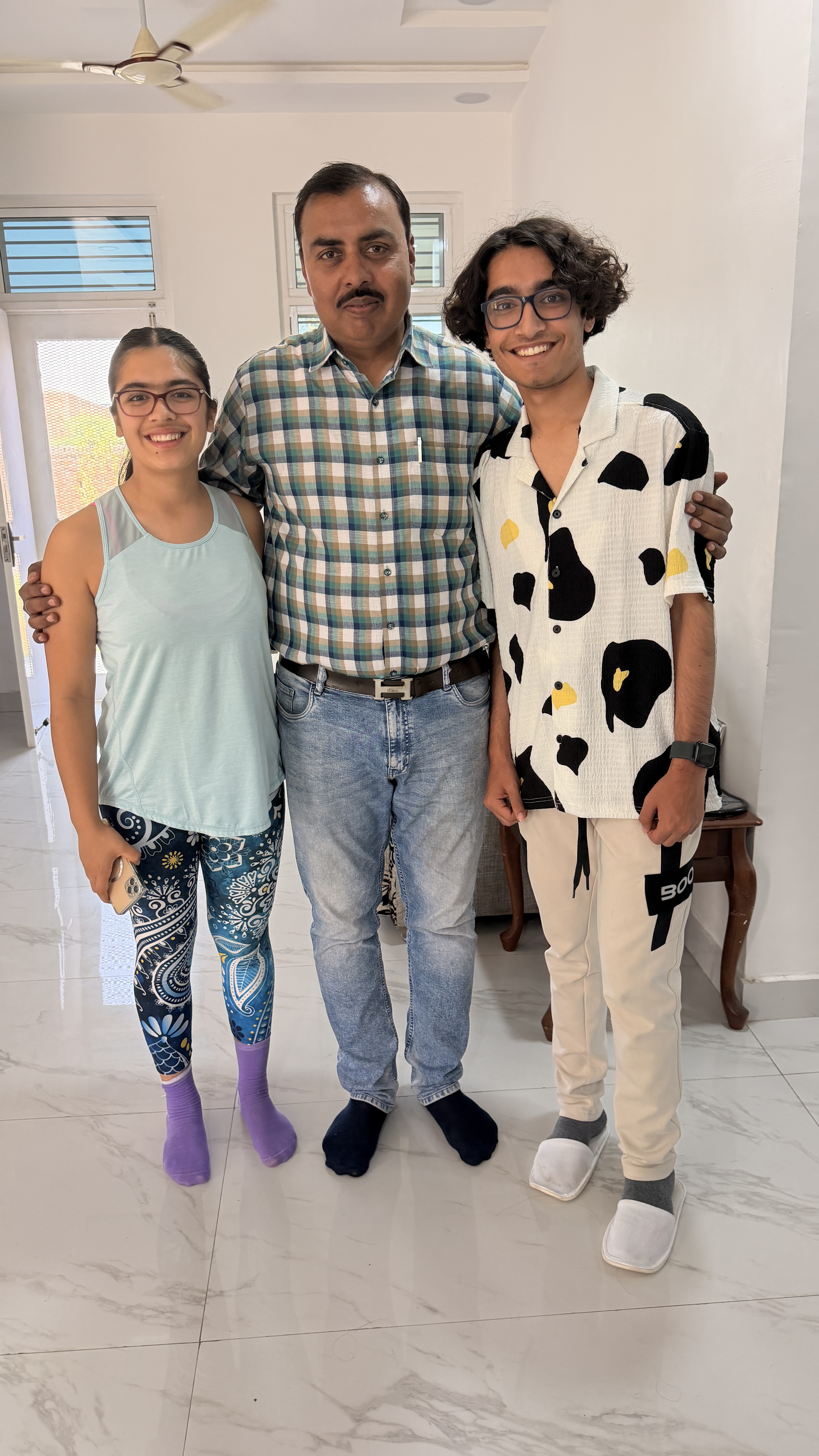 Heartfelt hug between Youth for Yoga team member and a student in Ferozabad