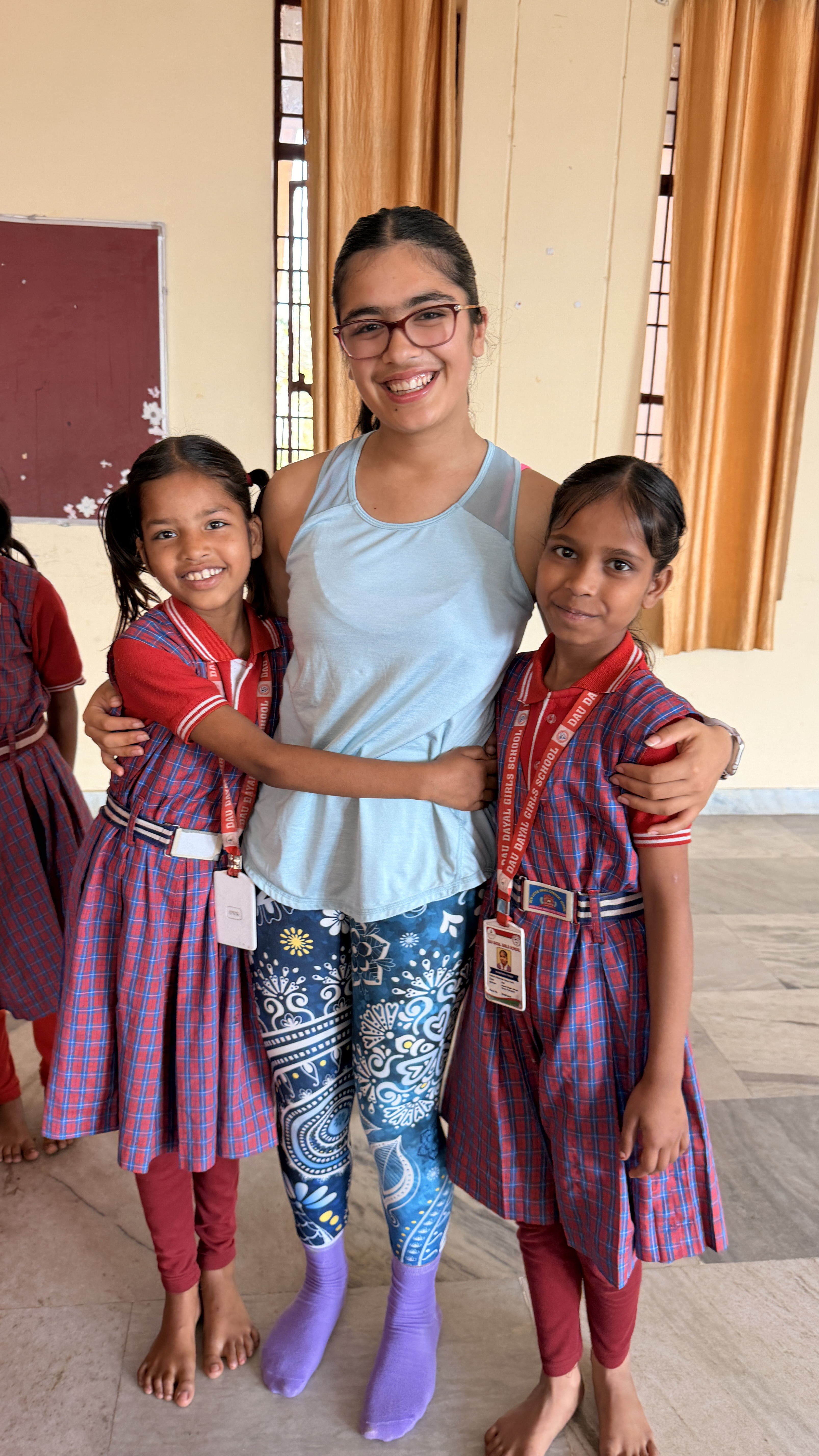 Youth for Yoga team and students sharing one last hug before leaving Ferozabad