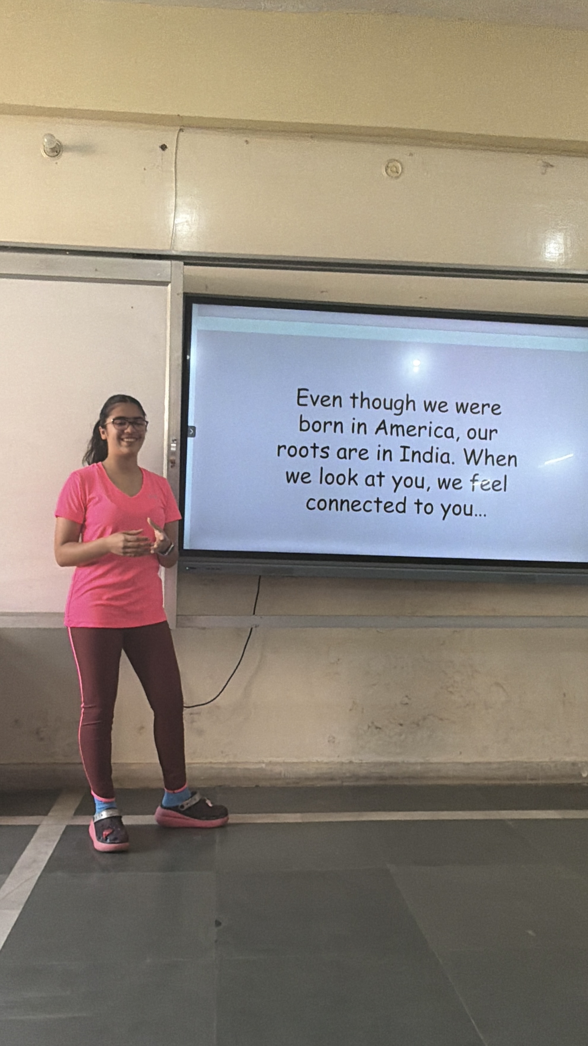 Students listening attentively to the Youth for Yoga team during introductions in Ferozabad