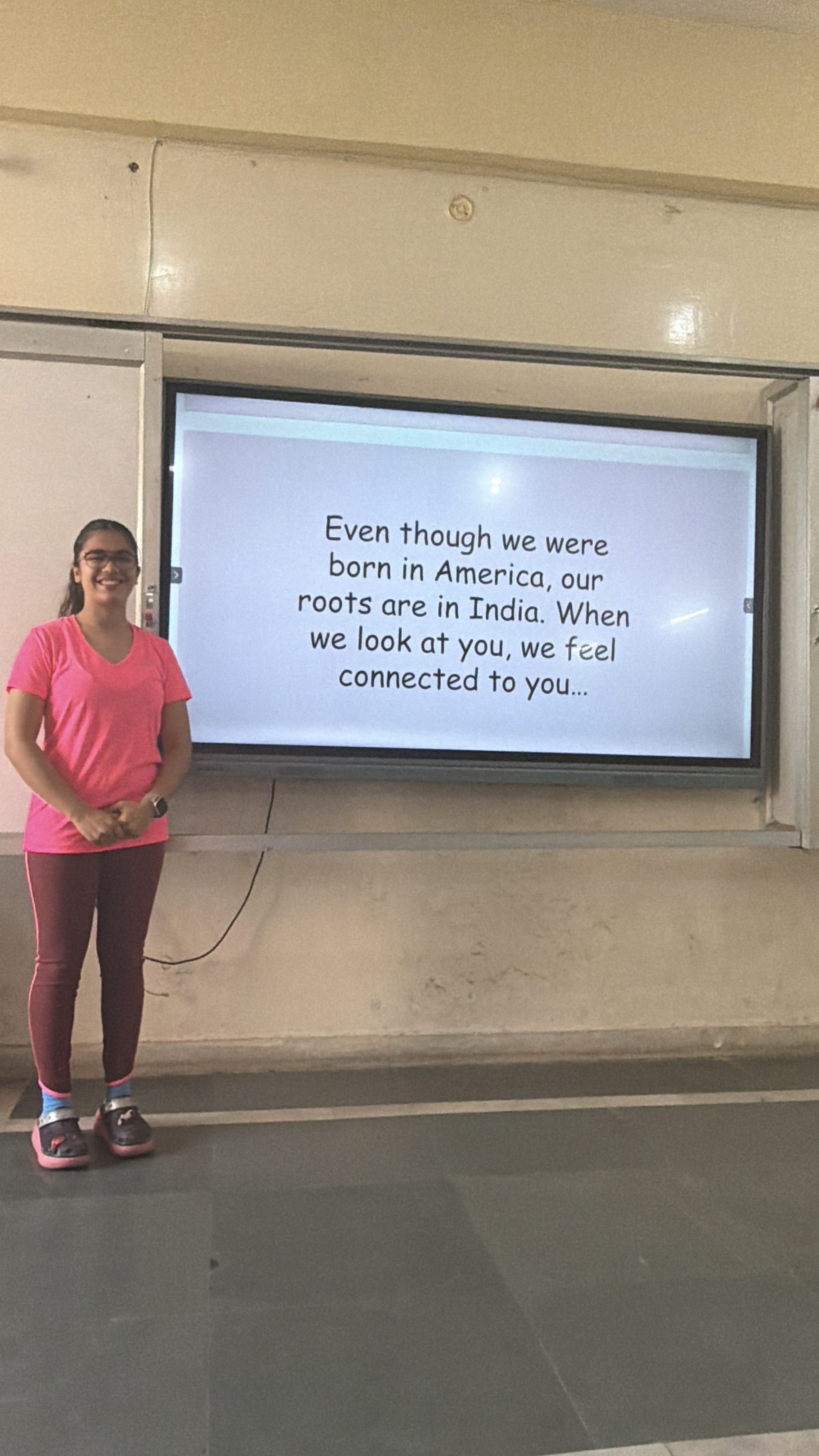 Youth for Yoga team doing a warm-up activity with students at a school in Ferozabad