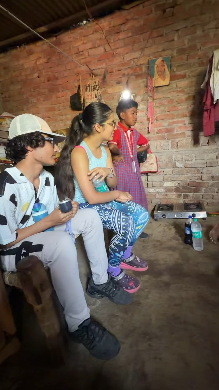 Youth for Yoga team sharing tea with a student's family in Ferozabad, India