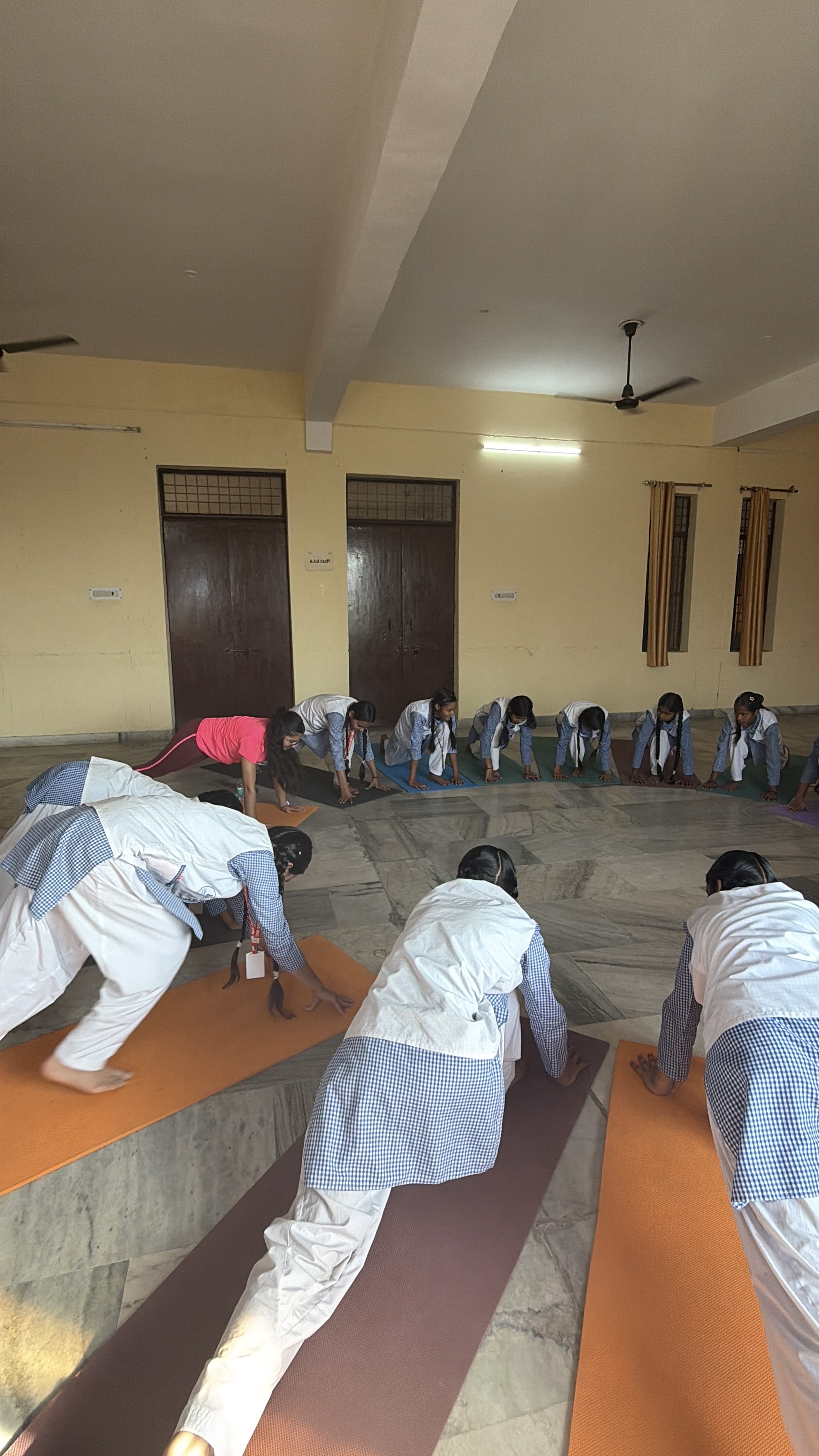 Youth for Yoga instructor showing enthusiasm while teaching yoga to students in India 2026