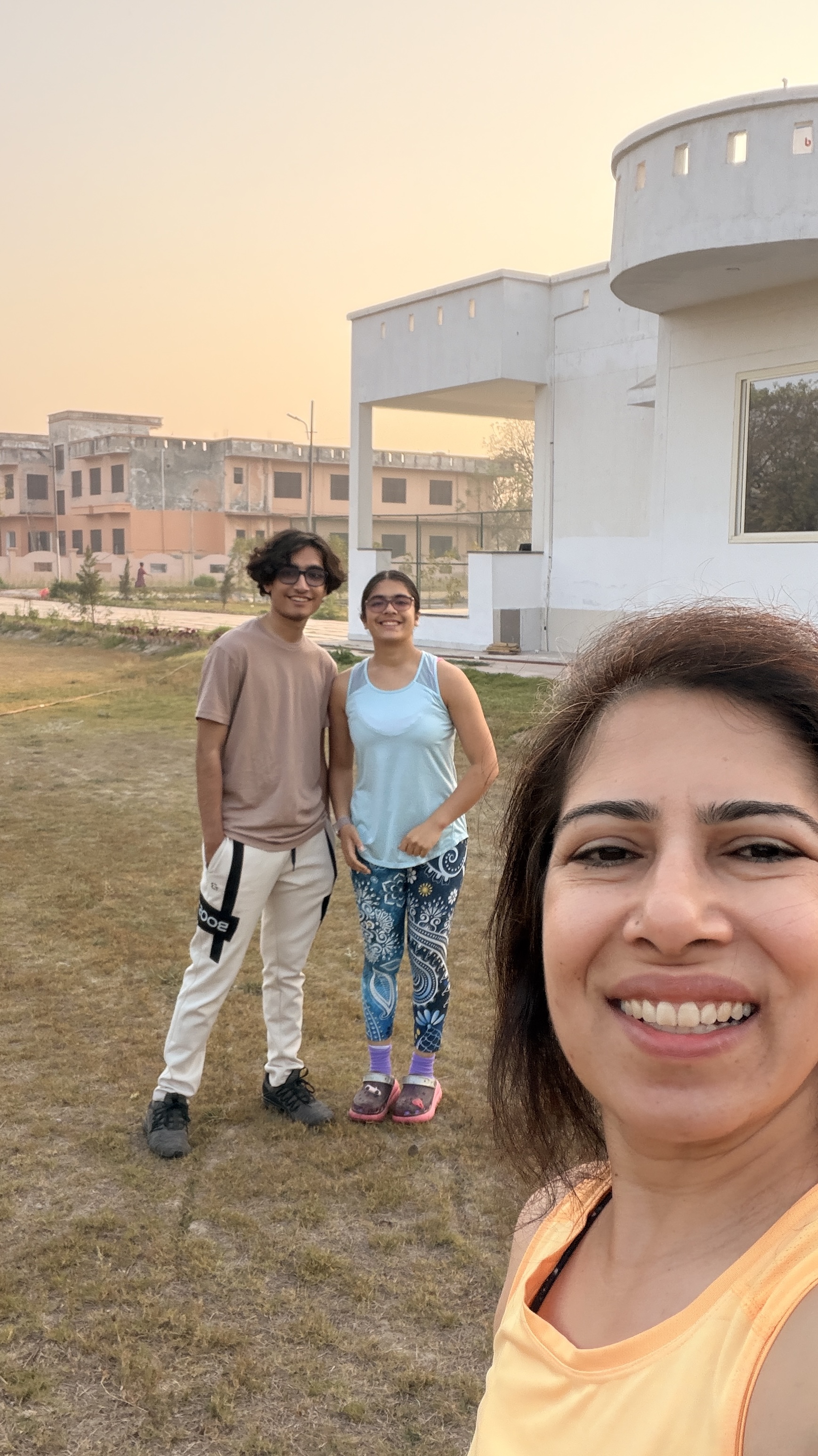 Teaching yoga to students in Ferozabad
