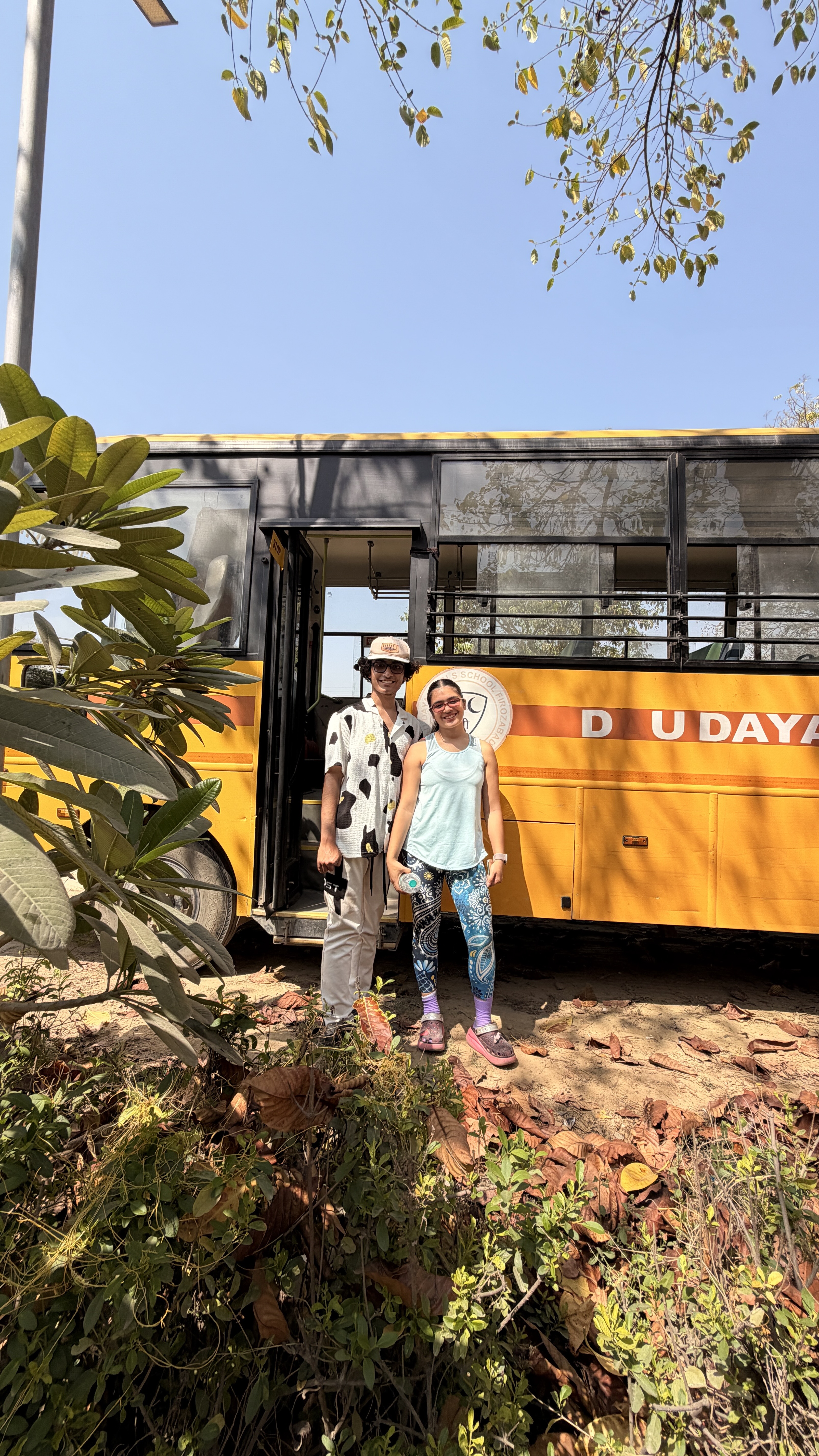 Youth for Yoga team sharing heartfelt farewell hugs with students in Ferozabad, India